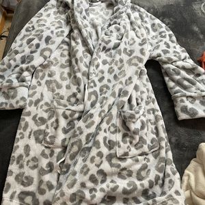 gray and white leopard robe